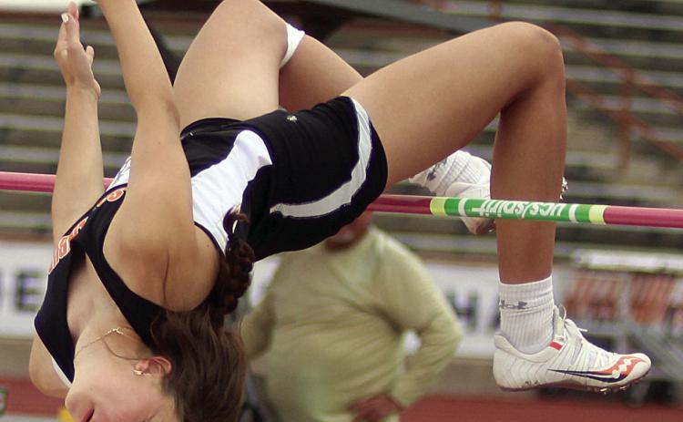 WINNING LEAP – Meredith Magliolo clears 5-feet, 5-inches on her second attempt Friday morning during the UIL’s State Track &amp; Field Championships to secure the Class 2A gold medal in the high jump. Sticker Photo By Darrell Vyvjala