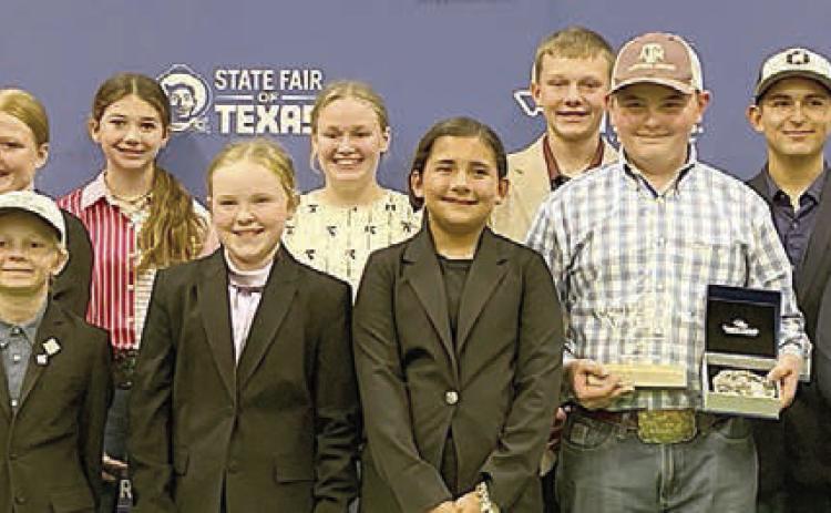 Fayette County 4-H’ers participating in the State Fair of Texas Livestock Judging Contest were (front row, from left) coach Kaci Carrales, Emma Zweschper, Joe Carrales, Abigale McBride, Chandler Brooks, Abraham McBride, Hudson Holub, Rowdy Guenther, (back row) Logan Poncik, Adalyn Carrales, Tatum Fritsch, Kaisley Janecka, Laramie Laake, Julia Melton, Holden Holub, Dylan Zwescpher, Crockett Guenther and Tate Fritsch.