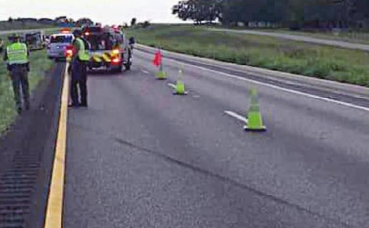 DPS, Fayette County EMS, and Schulenburg SVFD personnel attend to the accident in the median of I-10 last Wednesday which caused the outside westbound lane to be closed for about an hour and a half.