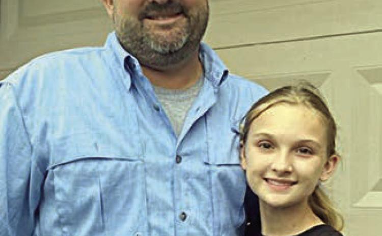 First place winner Brylee Brugger from La  Grange ISD with her father Chris Brugger