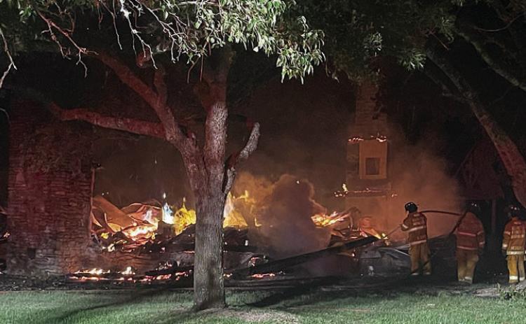 The Roun d Top-Warrenton Volun teer Fire Department fought a house fire on Hackemack Road near Kneip Road on Thursday, June 6. Photo Courtesy of Fayette County Sheriff’s Office