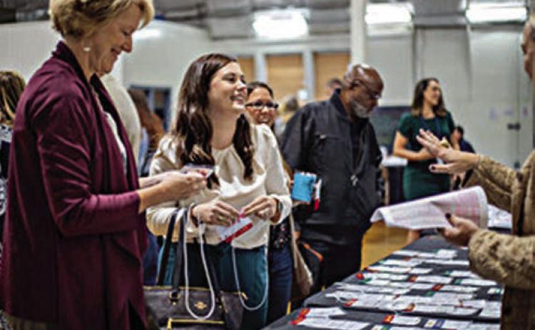 Guests check in to South Central Texas Rural Philanthropy Day, held on Friday, Nov. 3 at the Randolph Recreation Center in La Grange.