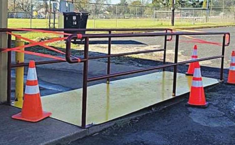 ‘THE BRIDGE’ – This ramp was installed at the Navidad Community Connections Center in Wolters Park on Tuesday, Nov. 2 by City of Schulenburg personnel so that the senior citizens don’t have to walk through water and/or mud to get to the front door.