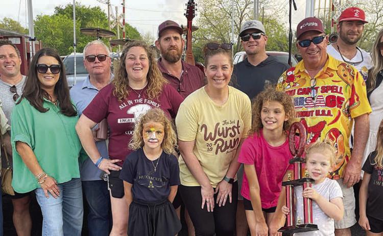 “ALL IN THE FAMILY” – (front, from left) June Schiffli, Lane Schiffli, Malynn Willey, Penelope Machac, Margot Machac; (middle row, from left) Pam Havrda, Amy Machac, Allison Machac, Kayla Willey, Tim Havrda; (back, from left) Dellyn Havrda, Jordan Machac, Jackie Machac, Scott Willey, Ryan Besetzny, and Ryan and Anna Havrda. Sticker Photo By Darrell Vyvjala