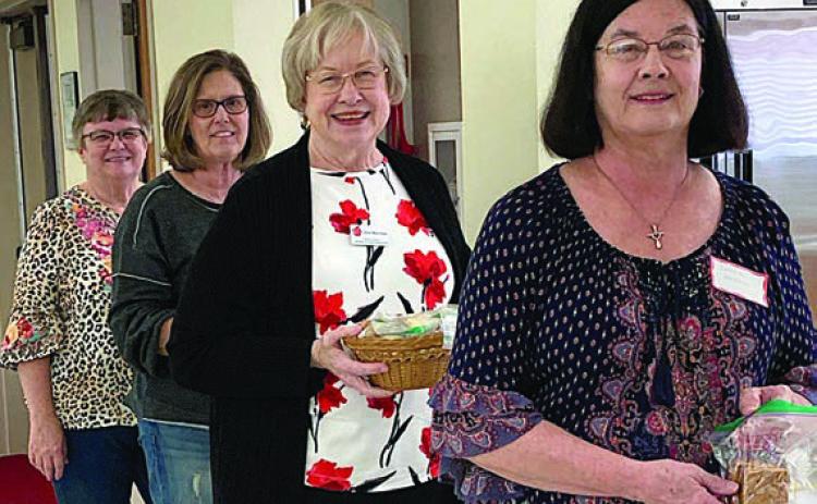 The Fayette County Retired Teachers Association held a “cookie swap” at the conclusion of the March 11 meeting. Shown are (from left) Kathy Migl, Debbie Morrill, Chris Morrison and Carobeth Fuchs Bockhorn.