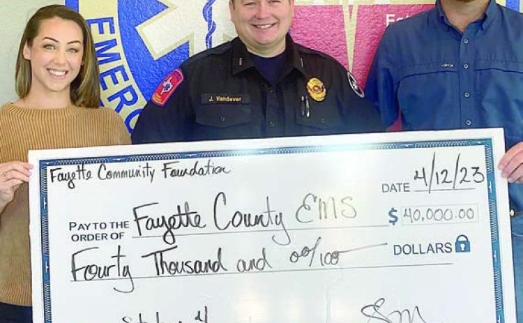 On hand for the $40,000 grant presentation were: (from left) Fayette Community Foundation Executive Director Susannah Mikulin, EMS Director Josh Vandever, and Precinct 4 Commissioner Drew Brossmann.