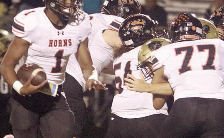 Horns continue push for playoff spot
