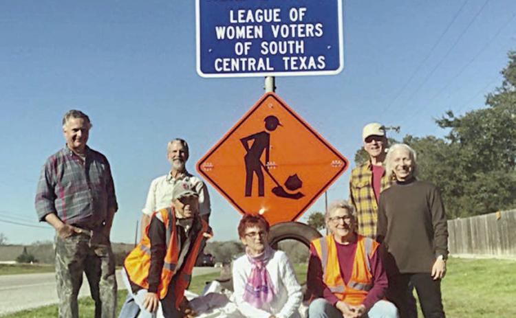 League of Women Voters group cleans along Highway 90