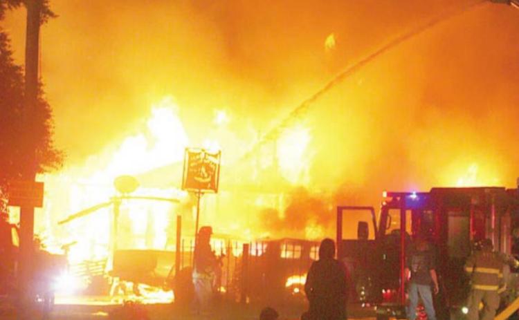 This photo of an early-morning fire that destroyed the home of a local family appeared in the Aug. 12 issue.
