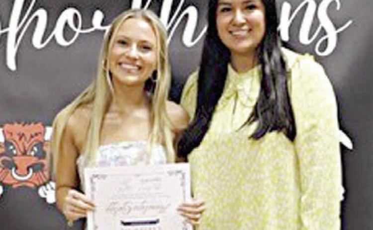 Ann elyse Ga lipp (left), Schulenburg High graduate, received the 2024 Ginger Stanzel Bosl Memorial Scholarship, with Melanie Ramirez (right), Stanzel Family Foundation program director, making the presentation.