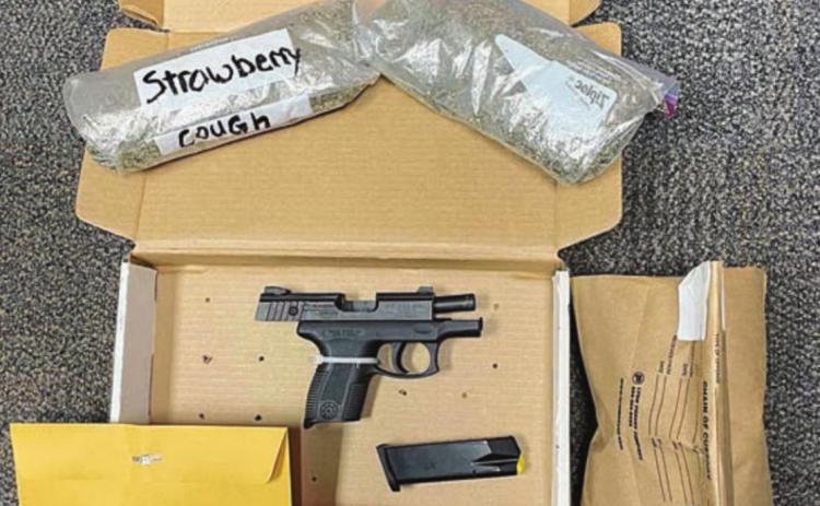 The drugs and handgun found by SPD officers in a vehicle at the local Pilot.