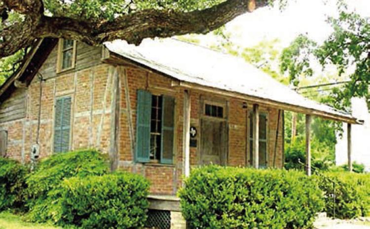 Frederick William Grasmeyer, who died in 1887, left a sizeable donation and his extensive personal library to start a library association in La Grange. Pictured is the original La Grange Library. Photo Courtesy of Fayette Museum &amp; Archives