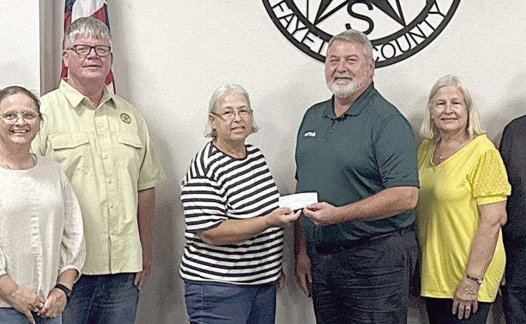 The Schulenburg Economic Development Corporation is pleased to partner with the City of Schulenburg on the installation of new playground equipment at the Sports Complex. Present at the check presentation were (from left) City Administrator Tami Walker, Alderman Greg Thomas, Kim Wellborn representing SEDC, Alderman Frank Wick III, Mayor Connie Koopmann, SEDC president Mark Friedrich, Alderman Kathy Kleiber, Alderman Roger Moellenberndt and Alderman Randy Mican.