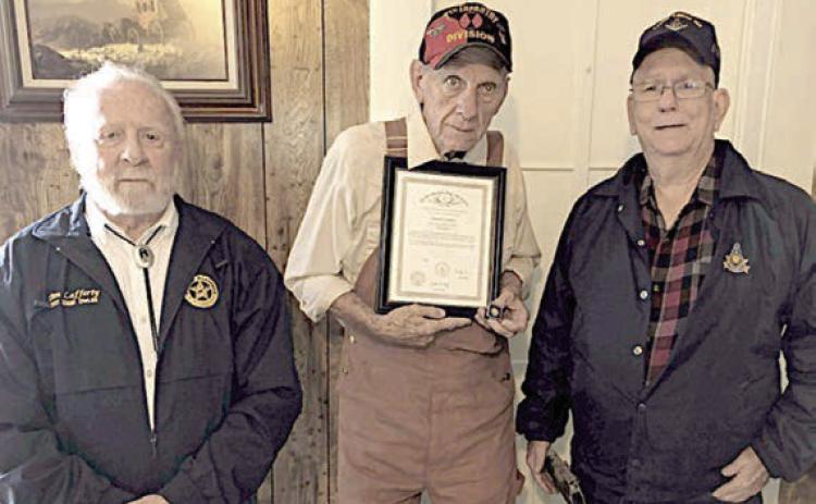 Grigson presented 60-year award by Masons