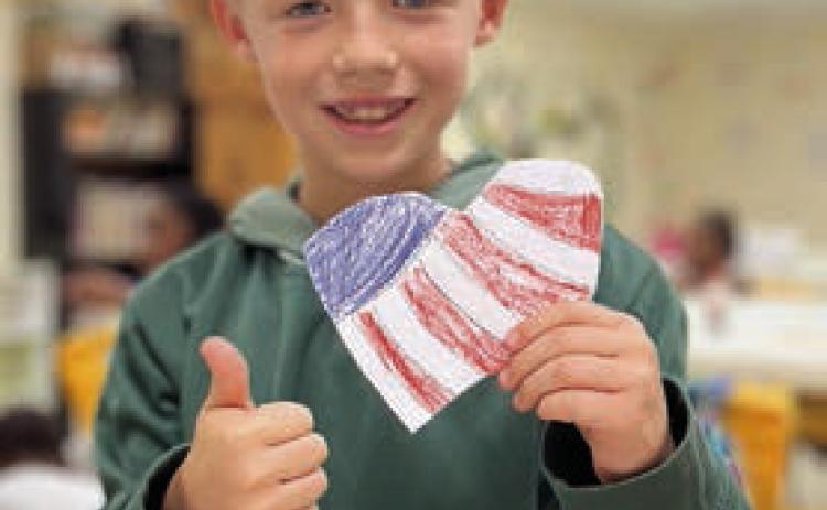Club members enthusiastically cut out and decorated their own Veterans Day hearts during last week’s arts and crafts program at the Schulenburg Unit. Boys &amp; Girls Clubs of Champion Valley wants to sincerely thank all veterans for their service. Shown is Club member Braxton Spradley.