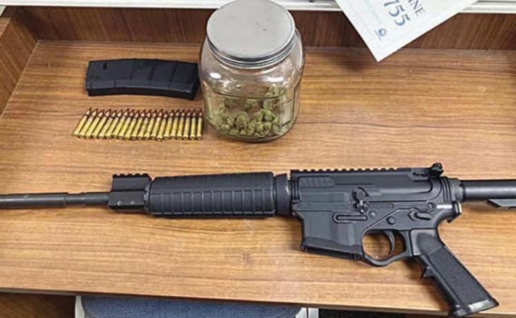 After a vehicle pursuit by law enforcement from Engle to east of Weimar, items confiscated from the vehicle included a stolen rifle and marijuana.