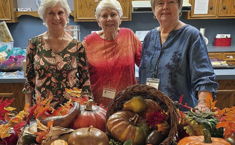 Hostesses were (from left) Delia Jurica, Mary Ann Jurica and Bonnie Baker.