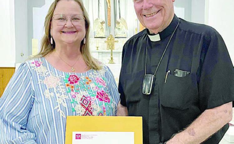 ROSANNE GALLIA (left) and FATHER JASPER LIGGIO