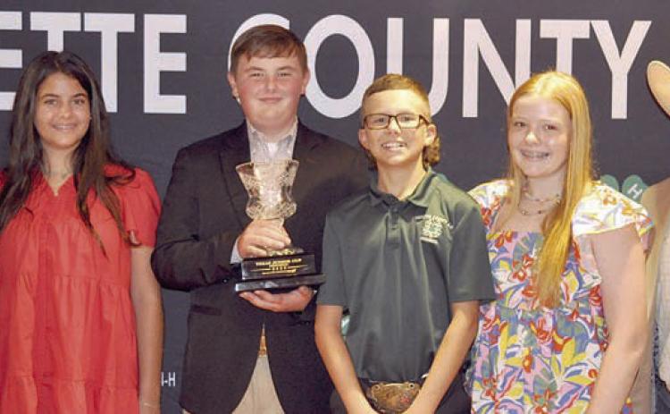 Texas Cup Livestock Judging – (from left) coach Kaci Carrales, Adalyn Carrales, Abraham McBride, Tate Fritsch, Kaisley Janecka and coach JoJo Carrales.