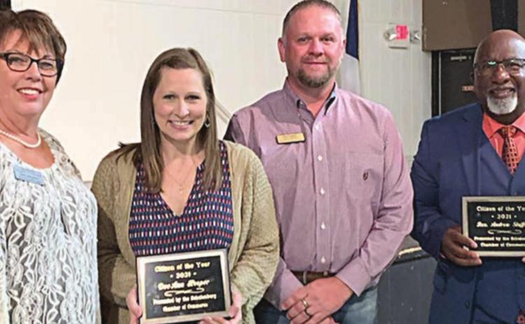 DeeAnn Hooper (second from left) and the Rev. Andrew Stafford (right) receive the Co-Citizens of the Year award from Chamber Executive Director Terri Wagner (left) and Chamber President Paul Zapalac. Sticker Photo By Dale Manning