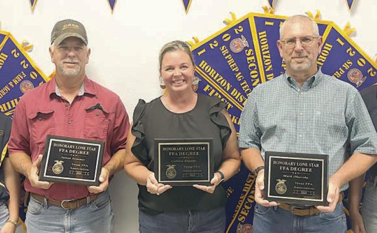 James Sommer (second from left), Callene Zapalac (center) and Mark Olsovsky (second from right) were awarded the Honorary Lone Star FFA Degree. They are shown with Keeley Warnken (left), Schulenburg FFA vice president, and Madyson Holub (right), Schulenburg FFA president.