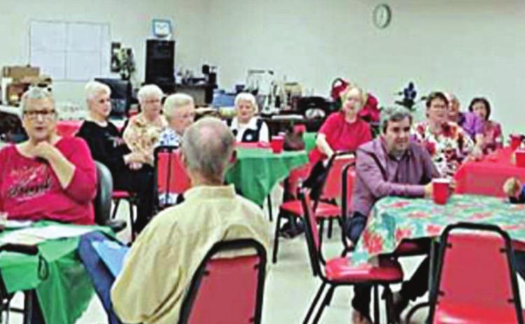 At the Navidad valley community connections Christmas lunch on Wednesday, Dec. 15, all seven board members were present to serve the senior citizens attending.