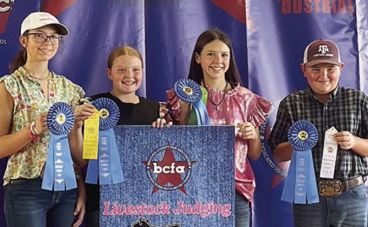 Champion Intermediate Team – (from left) Tatum Fritsch, Kaisley Janecka, Alexis Berckenhoff and Abraham McBride. Abraham McBride is a member of the Schulenburg 4-H.