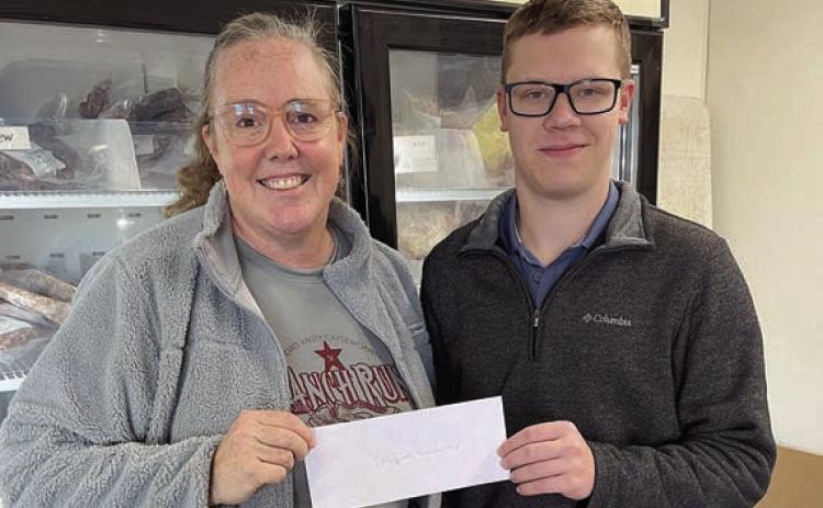 Gavin Kubala (right), 2021 graduate of Schulenburg High School, was a recipient of Navidad Valley CattleWomen’s first-ever collegiate scholarship. He is shown with Susie Shank, NVCW ways and means chair (left).
