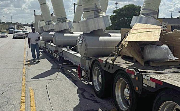 Oversized load knocks down lines Sunday
