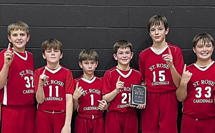 The St. Rose fifth-sixth grade B team includes (from left) coach Neal Goedrich, Justin Schramek, Levi Johnson, Hudson Ohnheiser, Barett Redman, Luke Goedrich, Jacob Schramek, Noah Heger, Andrew Besetzny, Jack Schiffli and assistant Laurie Goedrich.