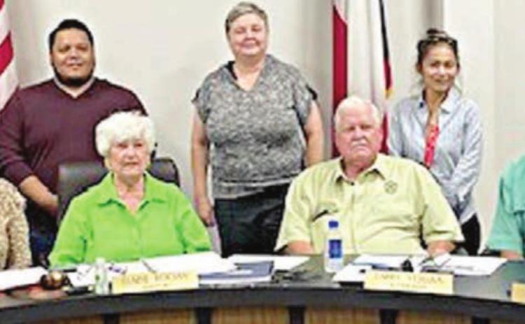CITY OF SCHULENBURG OFFICIALS and PAT personnel on hand for the signing of a proclamation honoring Parents As Teachers were (front row, from left) Greg Thomas, Place 1 Alderman; Wendy Fietsam, Place 2 Alderman; Mayor Elaine Kocian; Larry Veselka, Place 5 Alderman; Ben Herzik, Place 3 Alderman; Clarence Ahlschlager, Place 4 Alderman; (back row, from left) Phyllis Venghaus, Josue Rivas, Windi Raphael and Zulma Hay, representing Parents As Teachers.