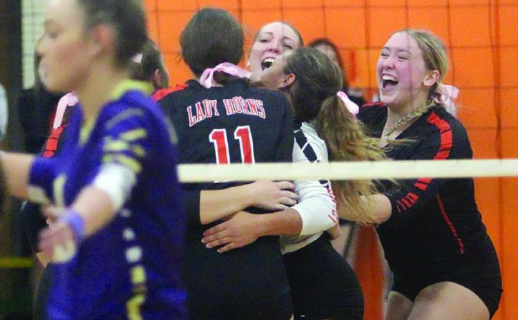 Lady Horns finish off district foes 10-0