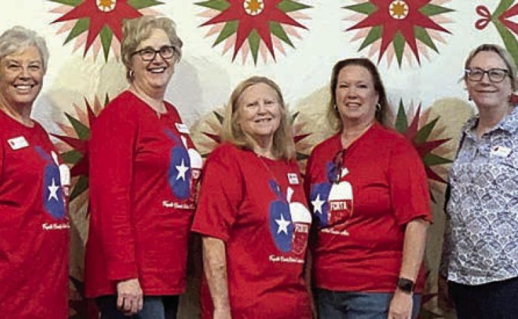 shown at the Texas Quilt Museum with Deborah Blanchette Bradley (right), museum managing director, are (from left) Kim Bonewald, Terri Wagner, Peggy Halamicek, Donna Burton, Lisa Slinkard, Kim Joost and Susie Grider.