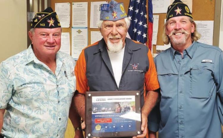 PRESEnting the Legacy Scholarship Donation Award to Riders director Herb Fish (center) is Schulenburg American Legion McBride Post 143 commander Bob Heinrich (left). Also shown is fellow Rider Gerald Smith (right).