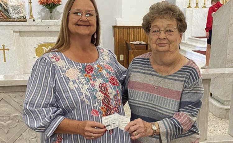 KJZT Society 66 of Weimar/Schulenburg recently held a bakeless bake sale, with part of the proceeds presented to St. Rose of Lima Catholic School in Schulenburg. Presenting the check to St. Rose principal Rosanne Gallia (left) is Kathy Bertsch (right), Society 66 vice president.